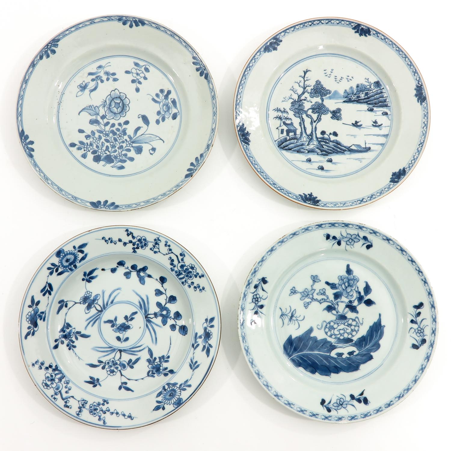 A Collection of 4 Blue and White Plates