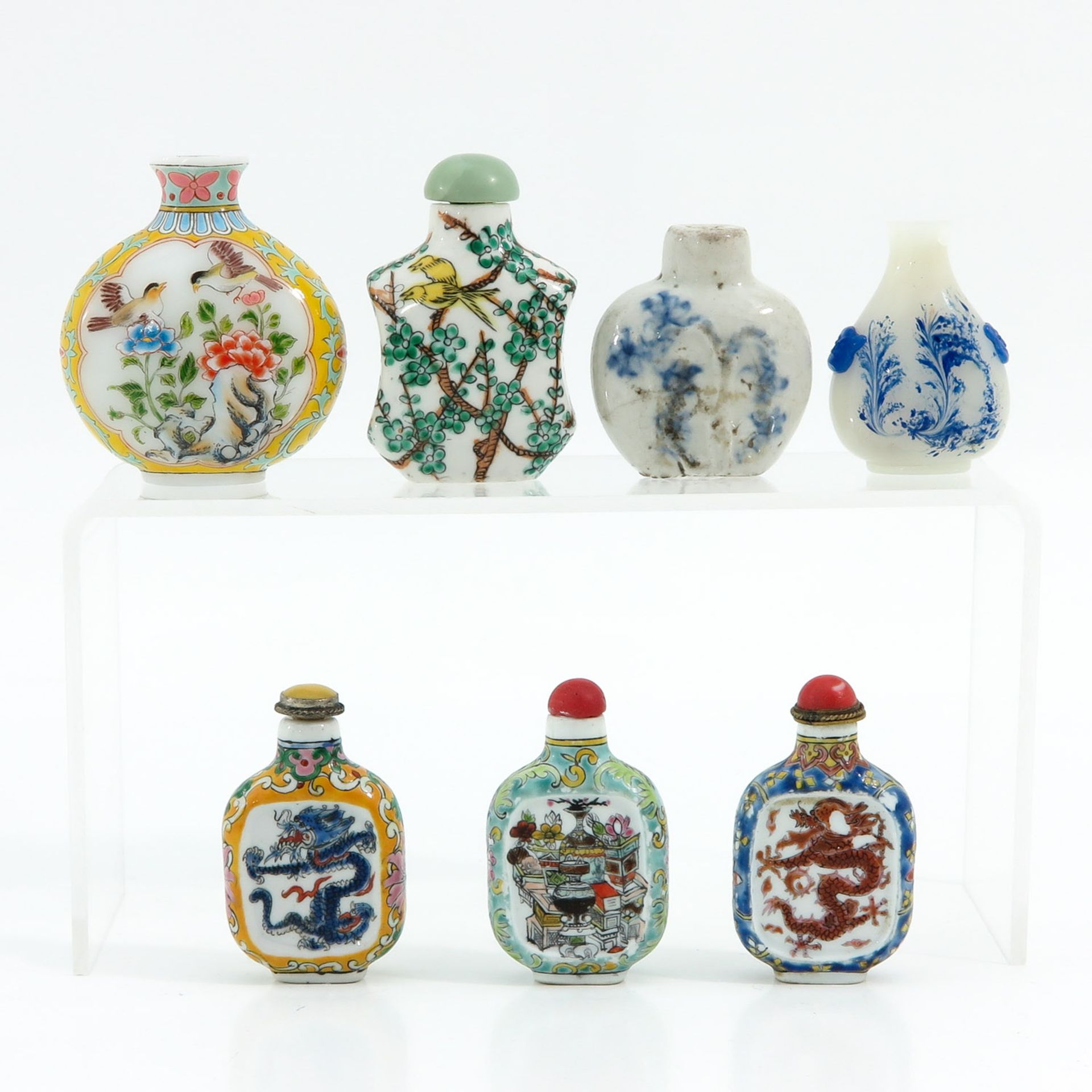 A Collection of 7 Snuff Bottles