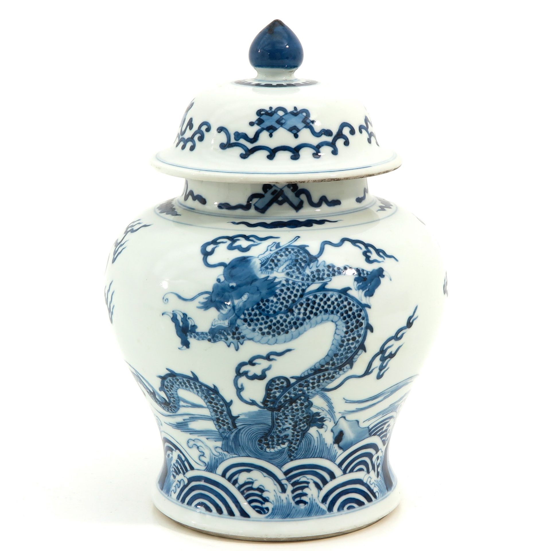 A Blue and White Vase with Cover