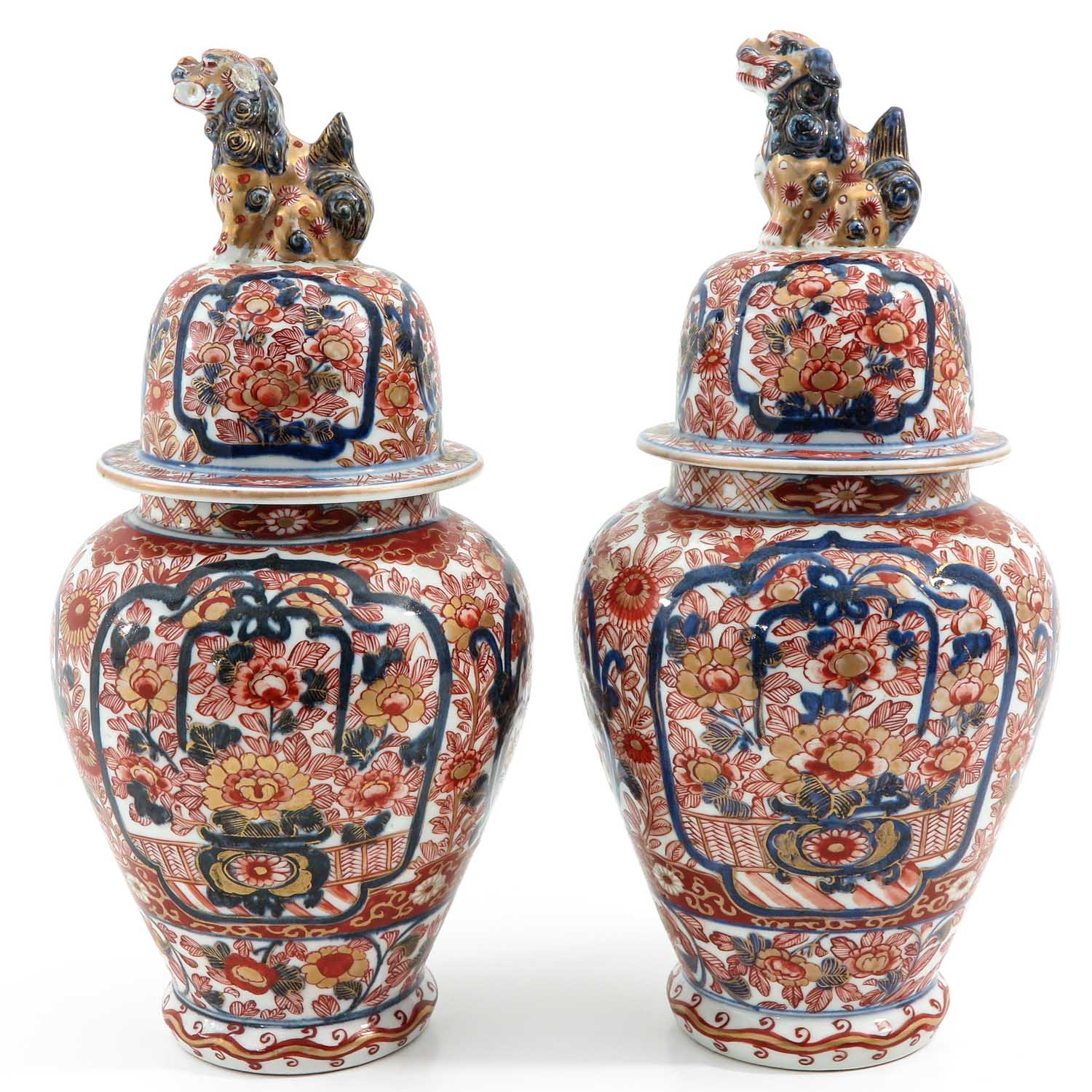 A Pair of Imari Vases and Covers