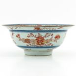 A Blue and Iron Red Bowl