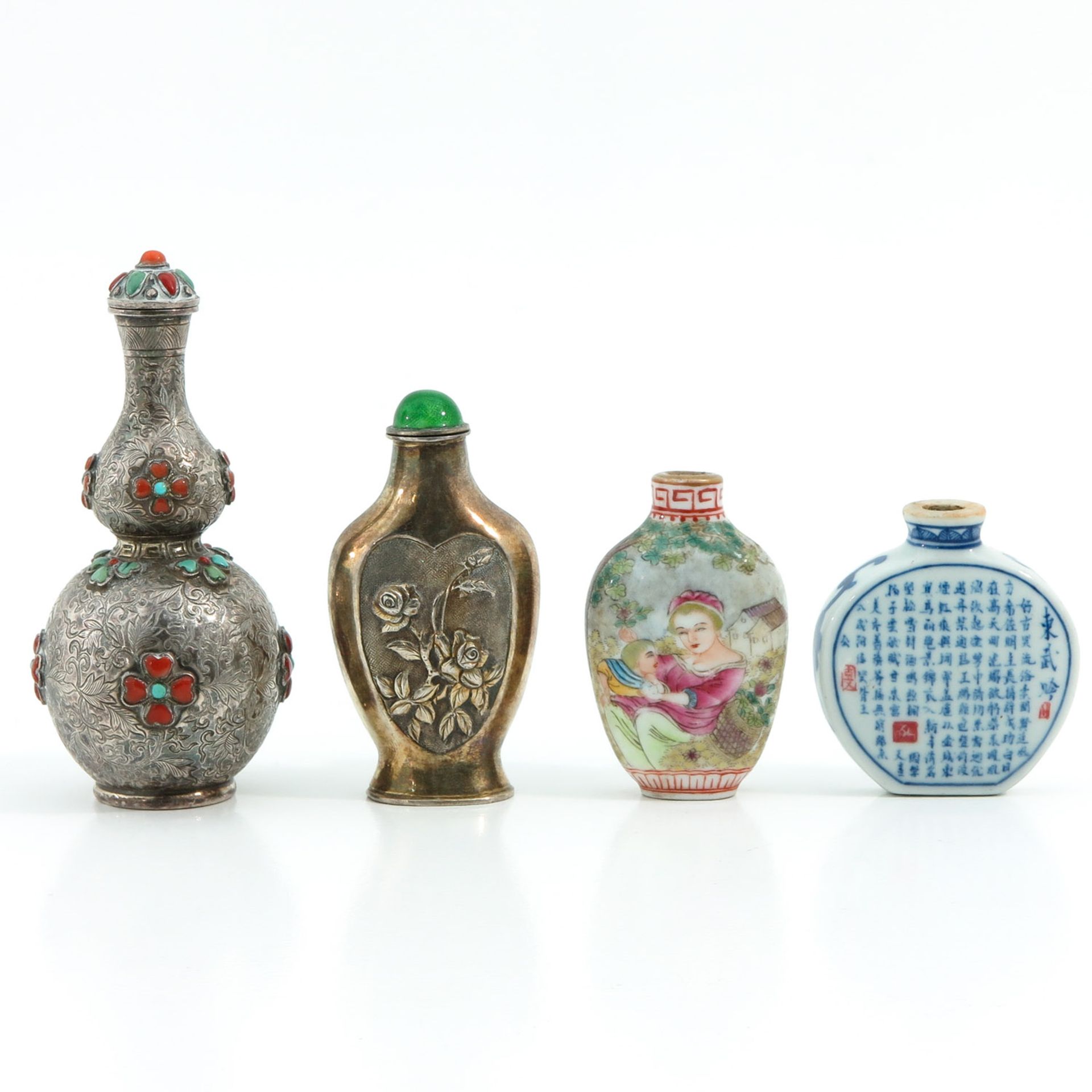 A Diverse Collection of 4 Snuff Bottles