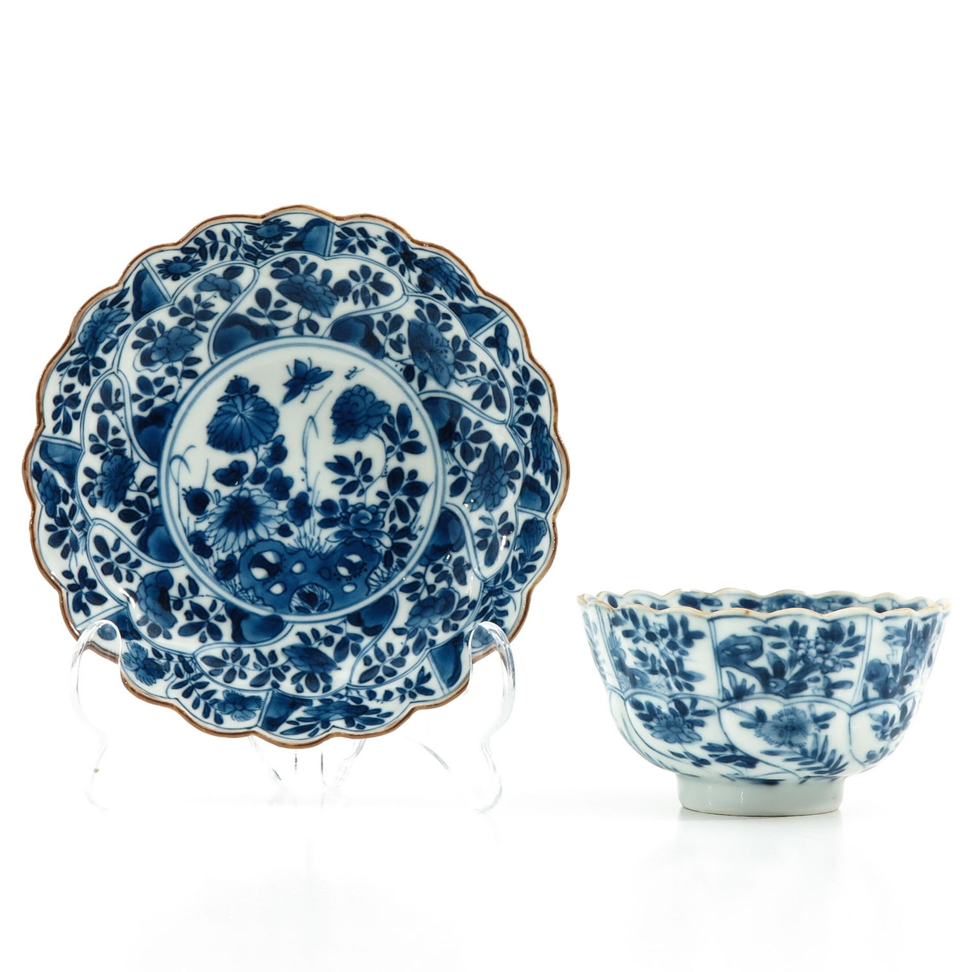 A Blue and White Cup and Saucer