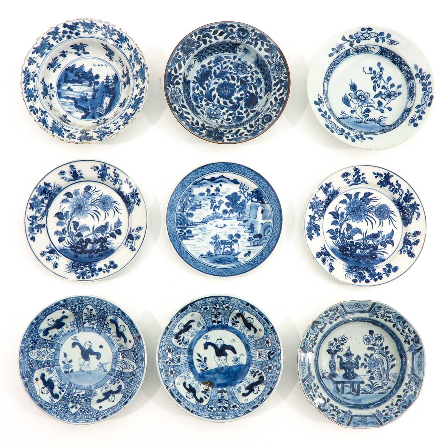 A Collection of 9 Blue and White Plates