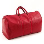 A Louis Vuitton Red Epi Leather Keepall 50