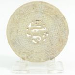 A Carved Stone Bi Disc