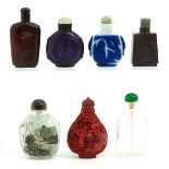 A Collection of 7 Snuff Bottles
