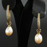 A Pair of 14KG Diamond Earrings