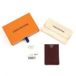A Louis Vuitton Taurillon Brown Leather Card Holder