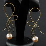 A Pair of 14KG Diamond and Pearl Earrings