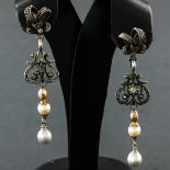 A Pair of Diamond and Pearl Earrings