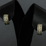 A Pair of 14KG Diamond Earrings