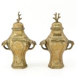 A Pair of Bronze Vases with Covers