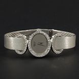 A Ladies 18KG Diamond Chopard Watch