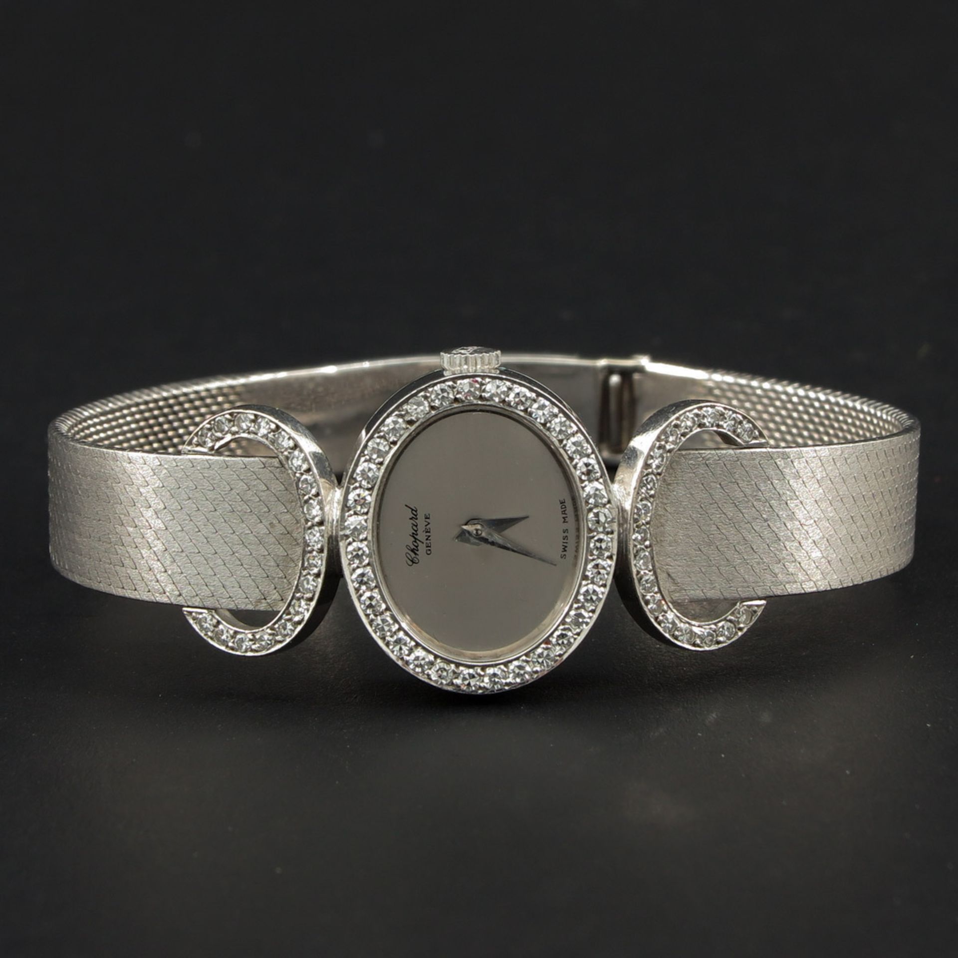 A Ladies 18KG Diamond Chopard Watch