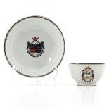 An Armorial Decor Cup and Saucers