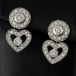 A Pair of 18KG Diamond Earrings