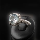 A Ladies 18KG Aquamarine and Diamond Ring