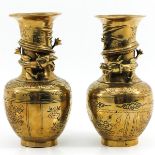 A Pair of Brass Vases
