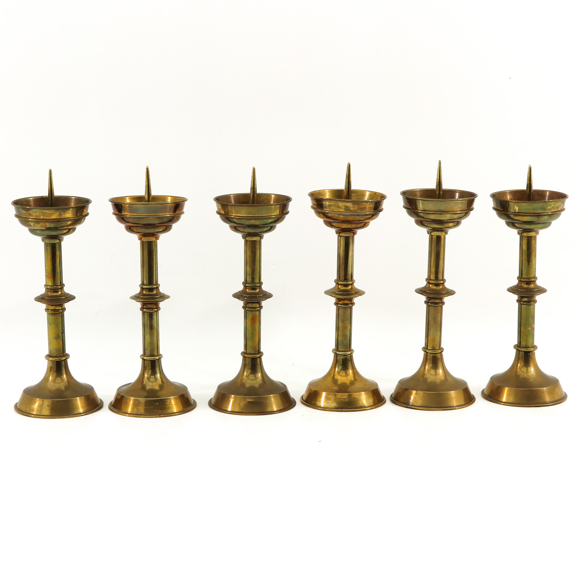 A Set of 6 Yellow Copper Altar Candlesticks