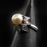 A Ladies 18KG Pearl and Diamond Ring