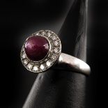 A Ladies 14KG Star Ruby and Diamond Ring