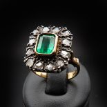 An 18KG Emerald and Diamond Ring