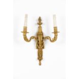 A pair of Louis XVI two branch wall sconces