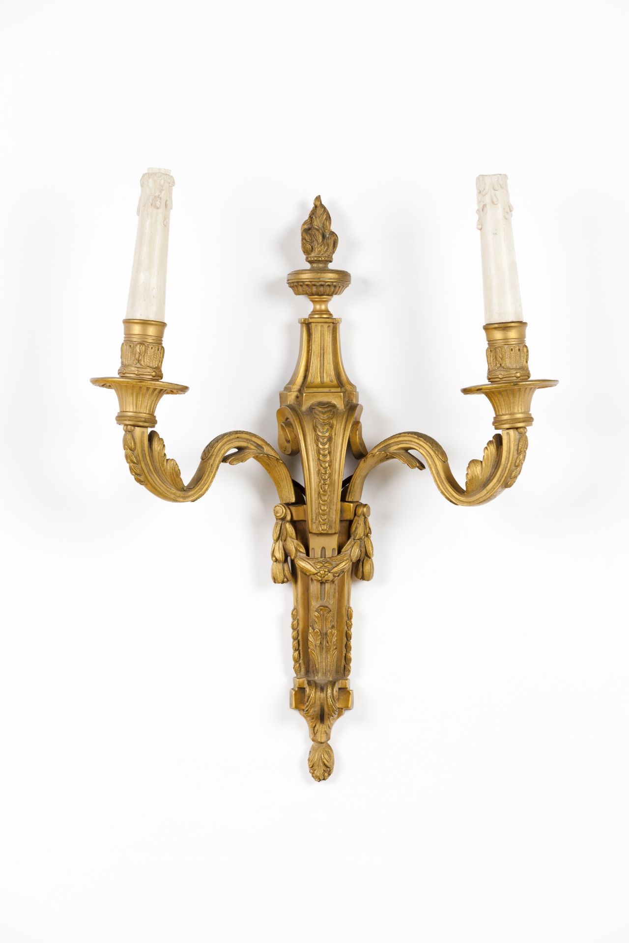 A pair of Louis XVI two branch wall sconces