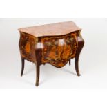 A small Louis XV style commode