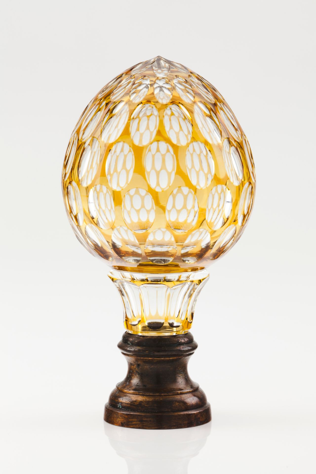 A pine coneAmber cut glass Metal fitting Height: 22 cm