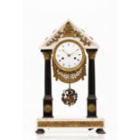 A Louis XVI table clock