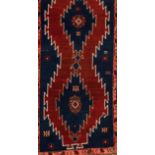 A Kazak rug, RussiaWool and cotton of geometric pattern in blue, salmon and beige shades