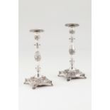 A pair of candlestandsPortuguese silver, 19th century Romantic period decoration, turned and fac