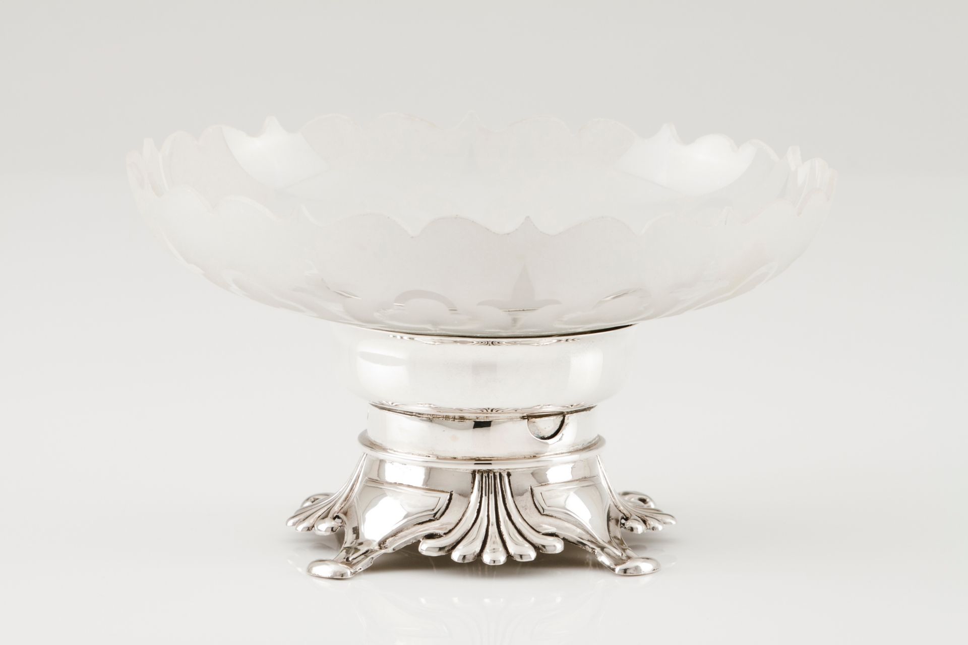 A footed bowlEngraved glass on a silver stand Raised and engraved decoration Boar hallmark 833/1