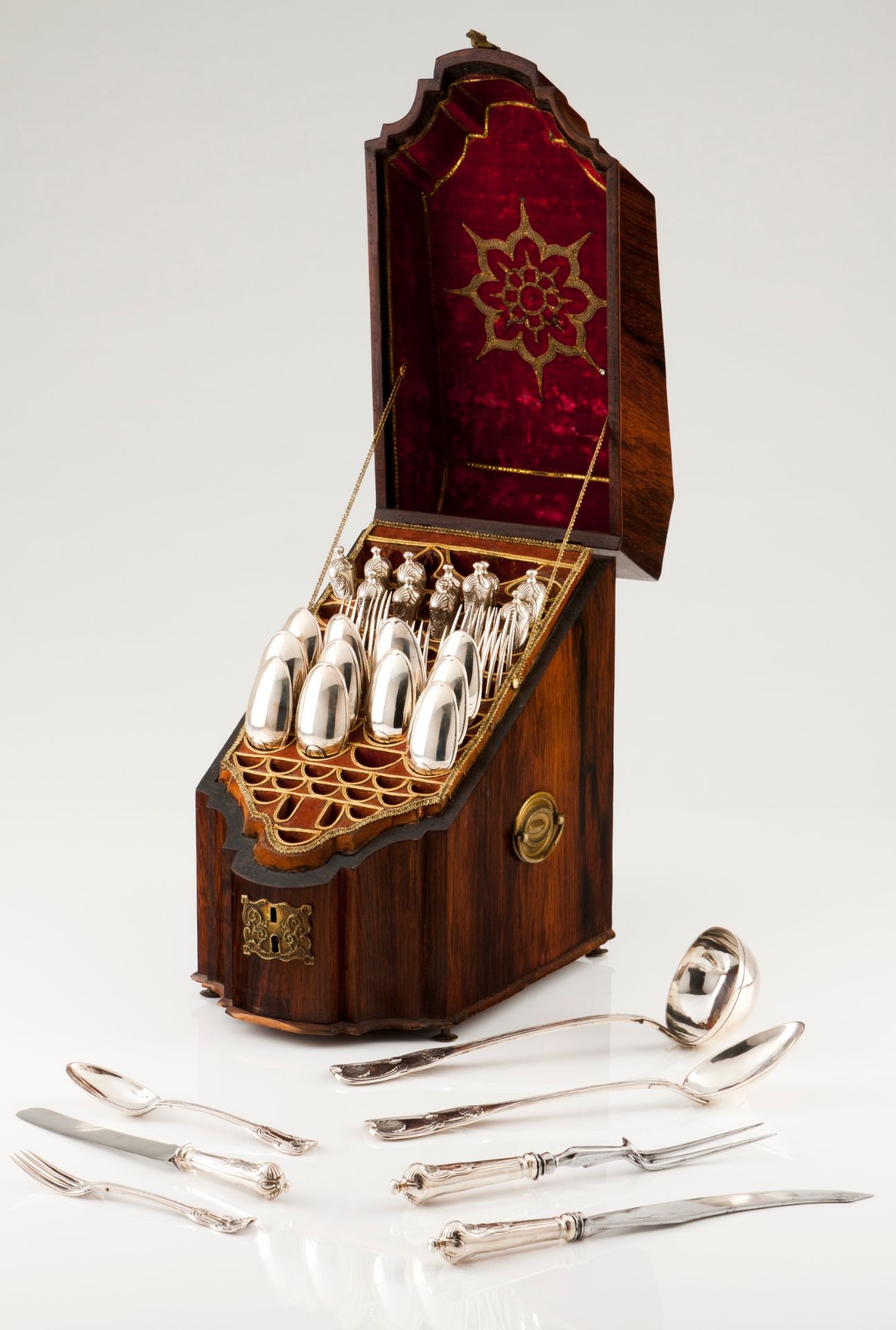 A cutlery set and knife boxPortuguese silver Grooved handles with winglets and shell decoration