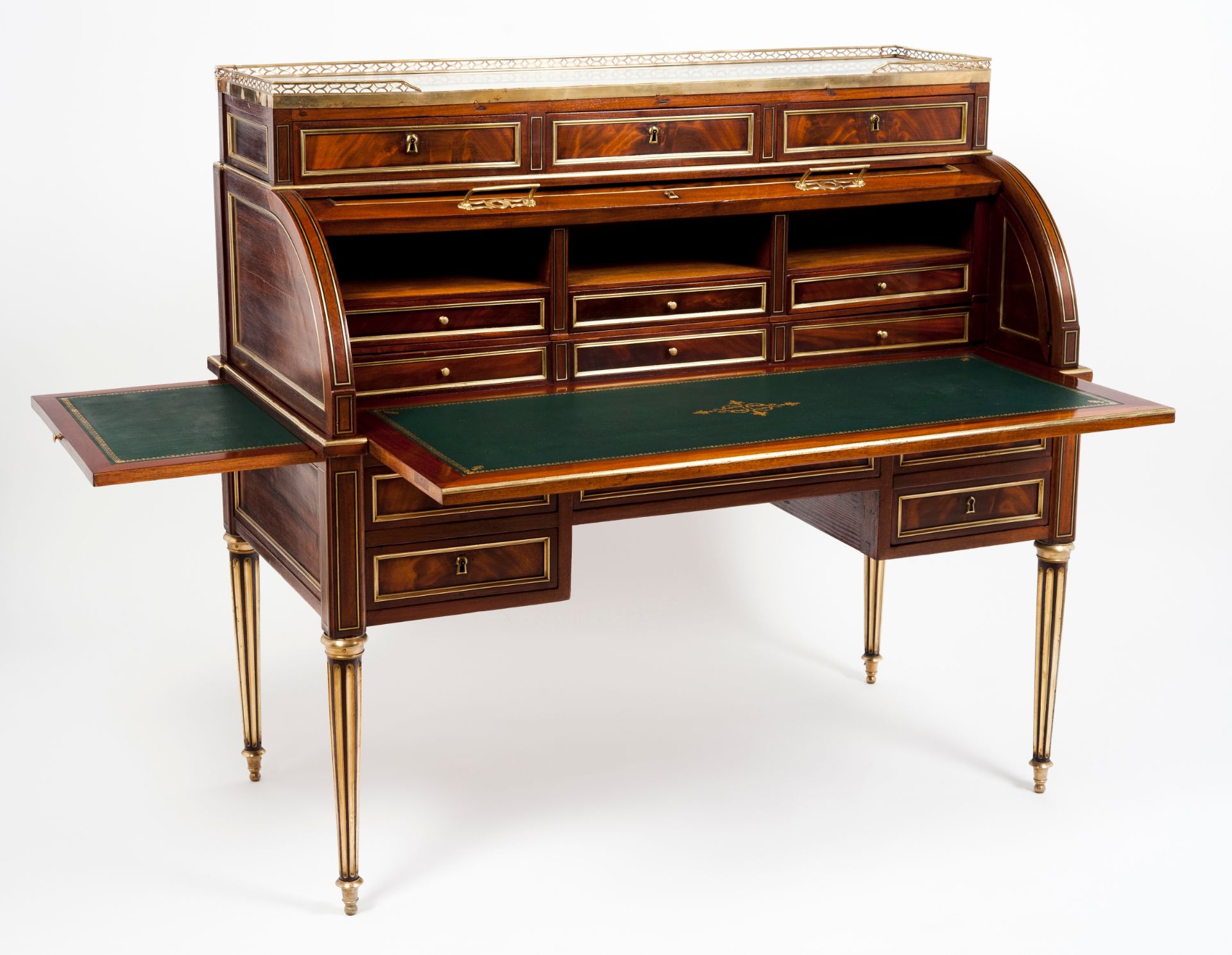 A Louis XVI style roll top desk