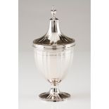 A sugar bowl with coverPortuguese silver, early 19th century Urn shaped body of fluted and facet