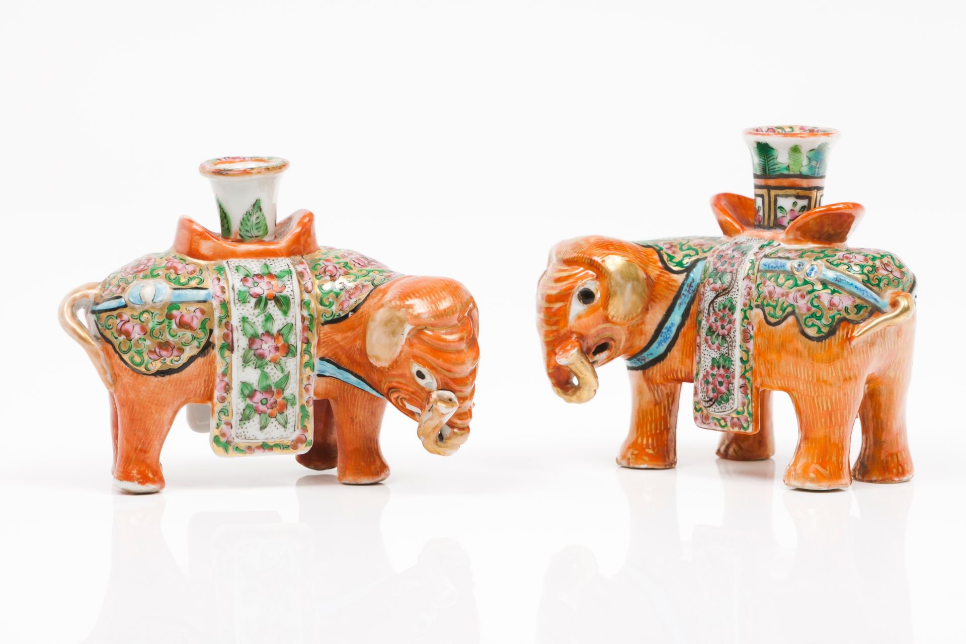 A pair of elephant candle stands