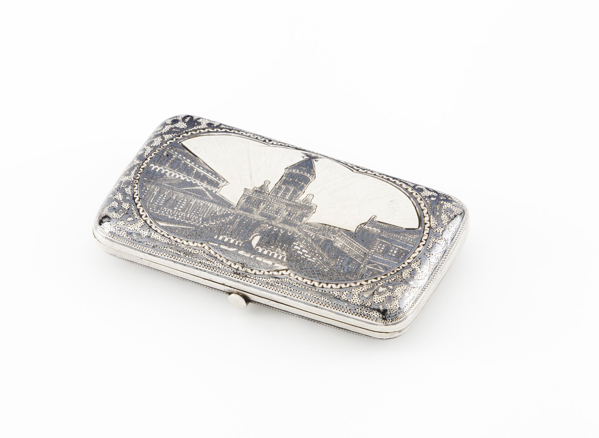 A cigarette caseRussian silver, 19th century Rectangular shaped of engraved and guilloche niello