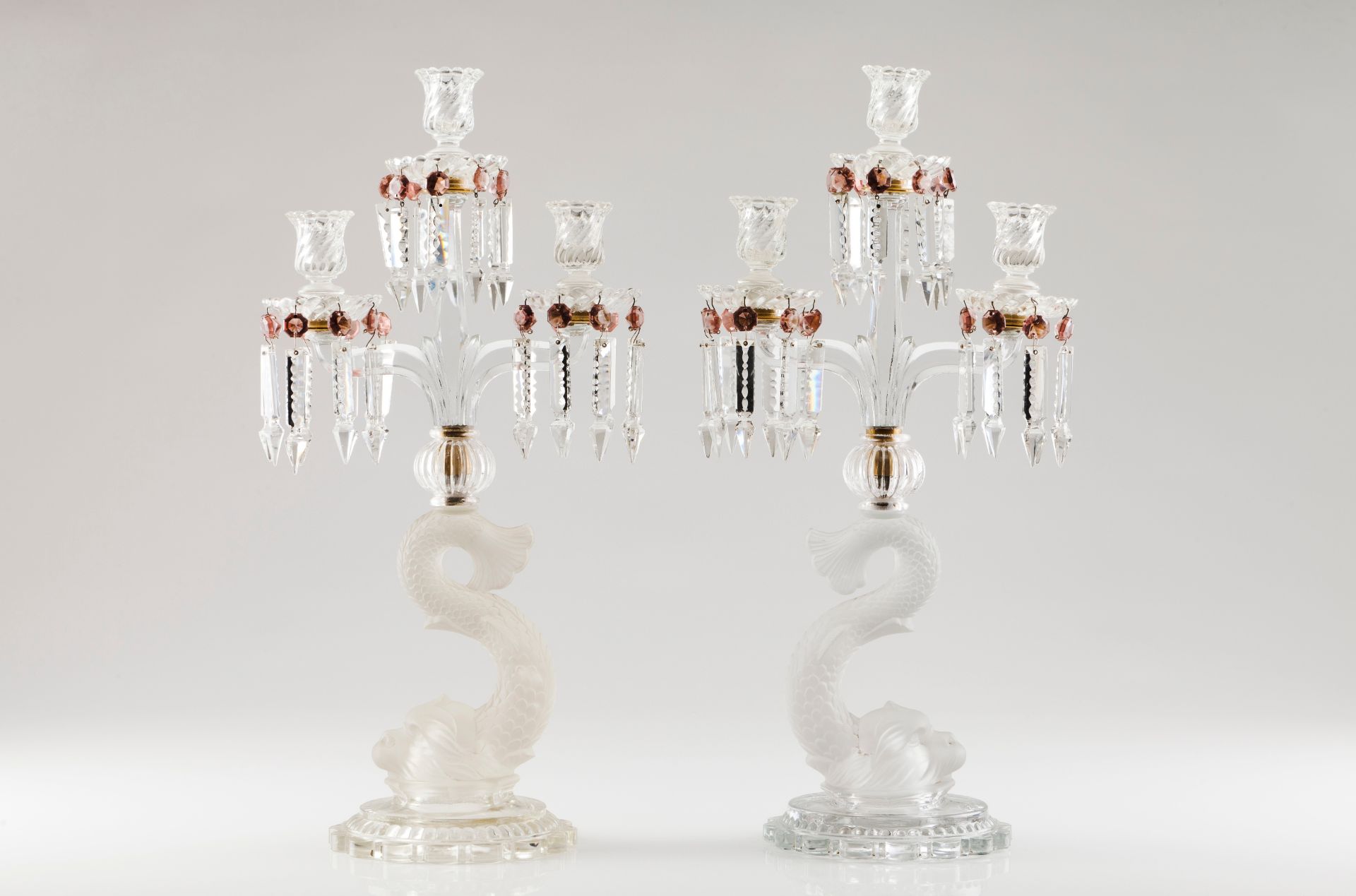 A pair of three branch candelabra