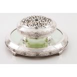 An Art Deco flower bowl with standPortuguese silver Circular shaped of geometric and rose decora