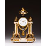 A Louis XVI table clock