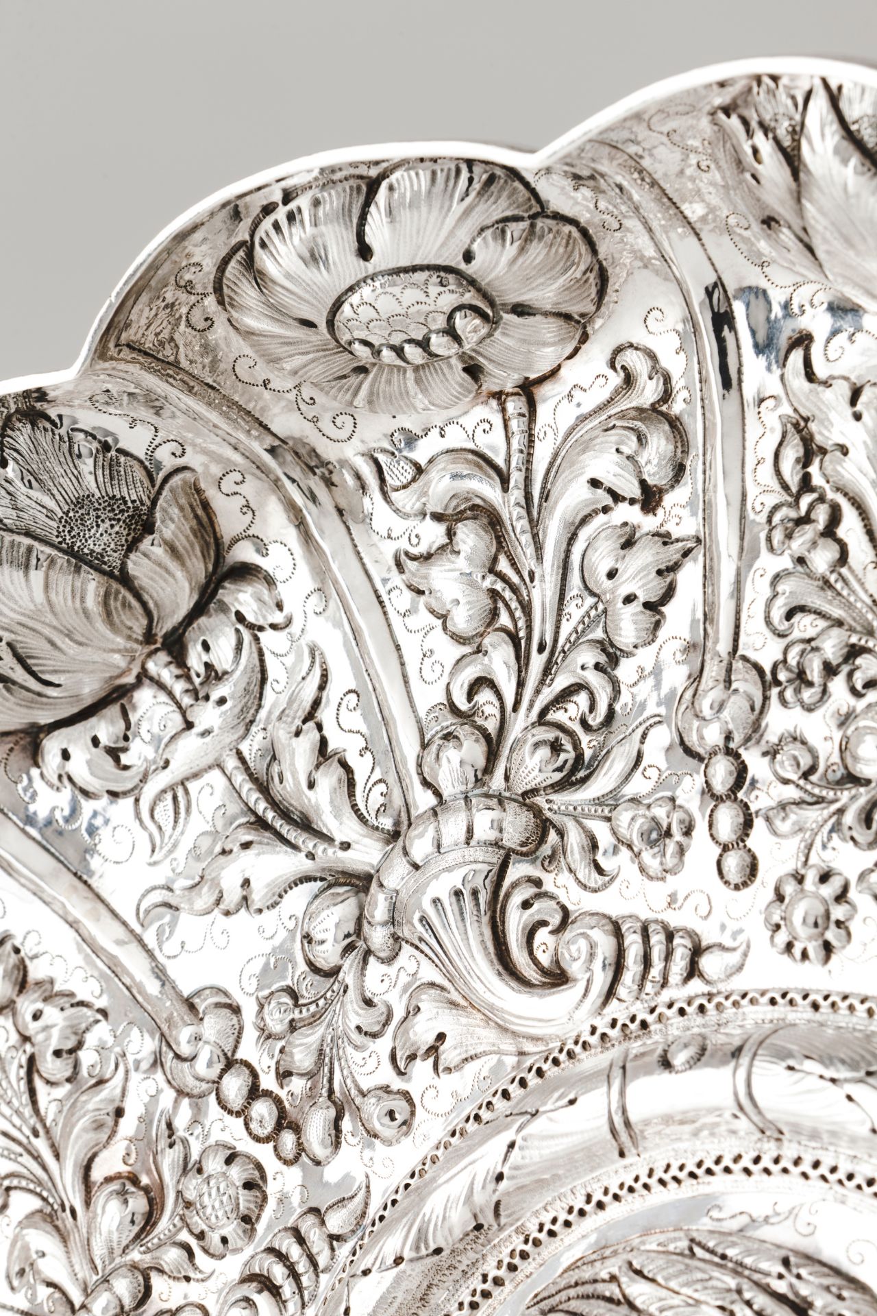 A large display salverSilver, 18th century Gadrooned of profuse repousse and chiselled foliage, - Bild 3 aus 3
