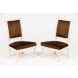 A pair of Louis XVI style low chairs