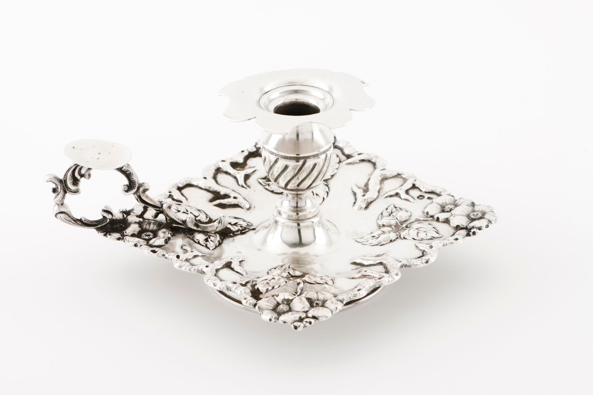 A chamber stickPortuguese silver Squared stand, of raised three trunk, floral and foliage decora