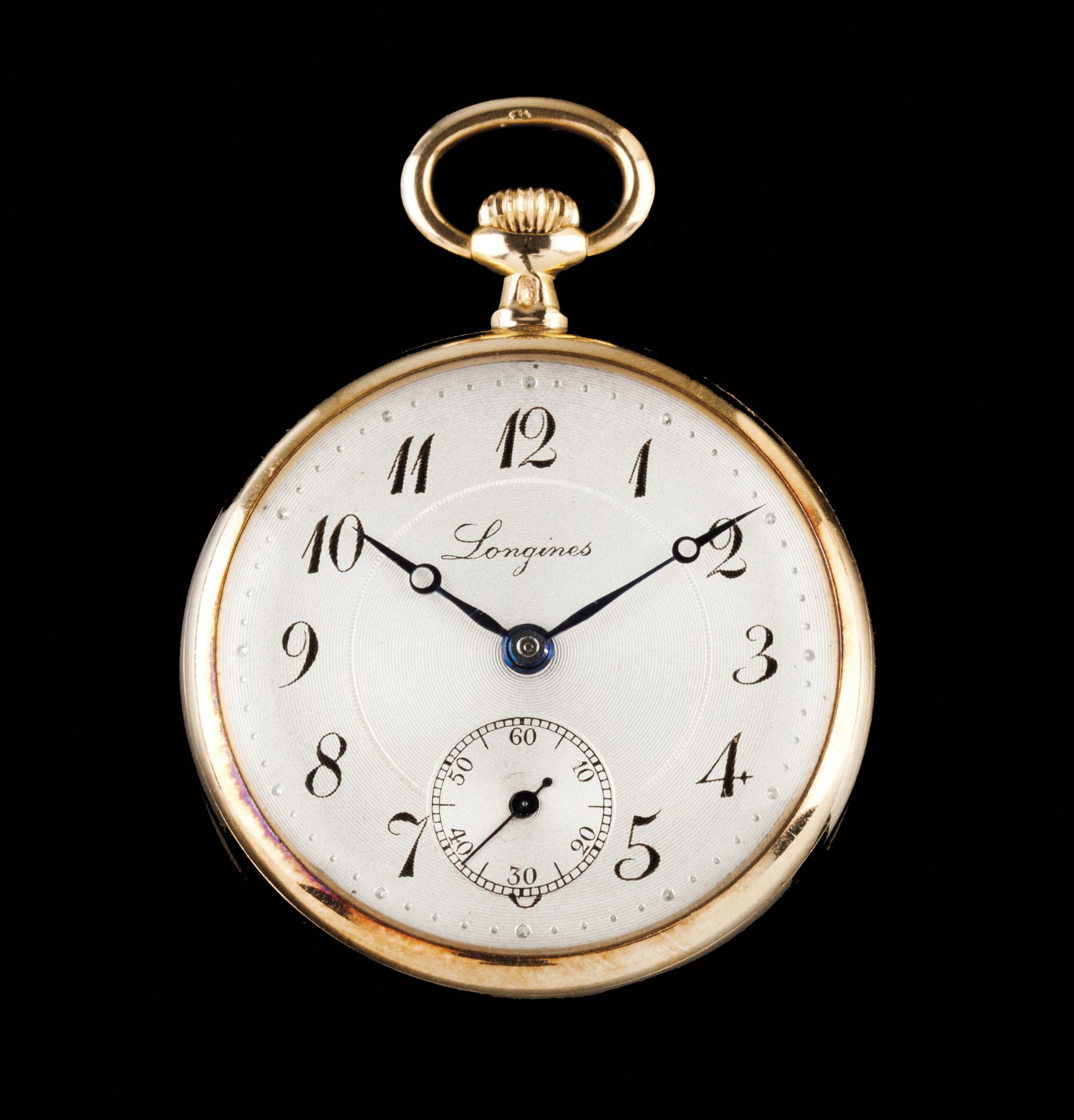 A Longines lapel watch