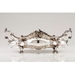 A large Romantic jardiniereSilver Profusely decorated with raised and chiselled foliage scroll m