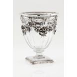 A VaseCut crystal with applied silver elements Floral and foliage decoration of garlands and aca