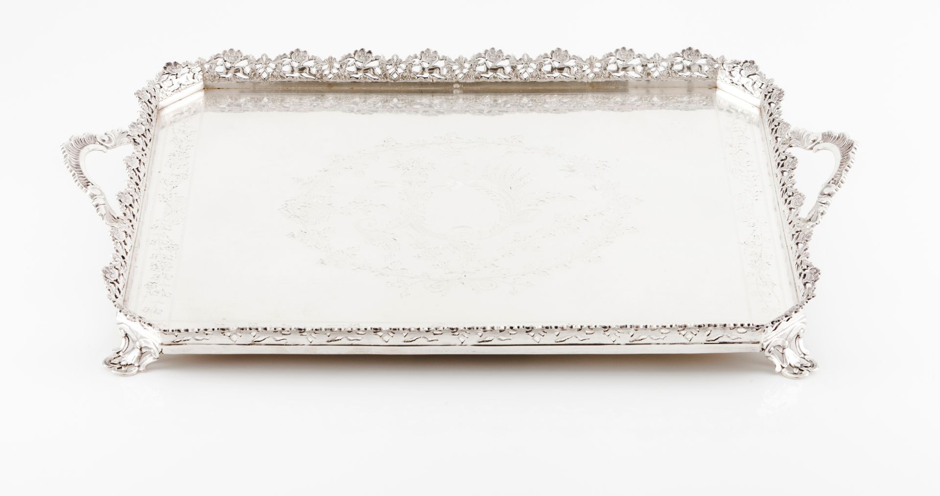 A galleried trayPortuguese silver Rectangular shaped of cut corners with engraved and chiselled